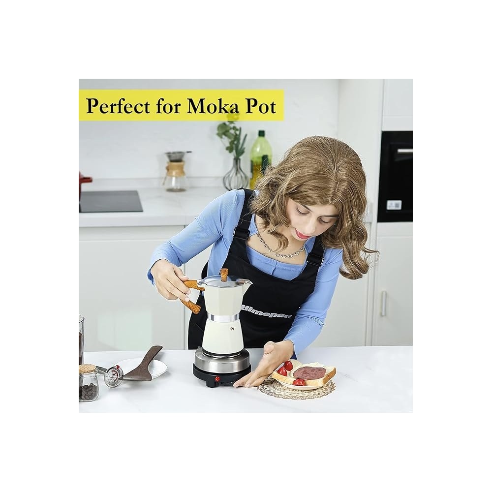 Hot plate heating a gold moka pot for coffee